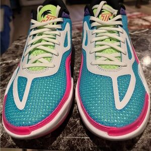 Jordan Athletic Shoes in Blue, Pink, and Green